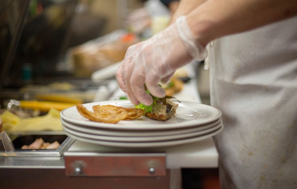 A cook working at the open kitchen